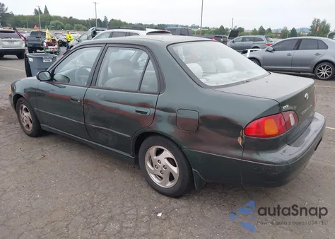 2000 Toyota Corolla Le from USA, damaged, VIN 1NXBR18E3YZ305285